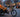 Electric trike decorated with Halloween lights and a jack-o'-lantern in its cargo basket